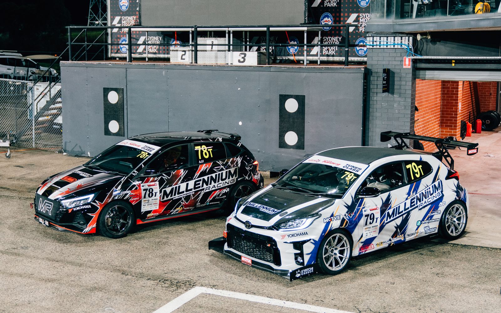 Millennium Racing's two time attack cars in pit lane at Sydney Motorsport Park